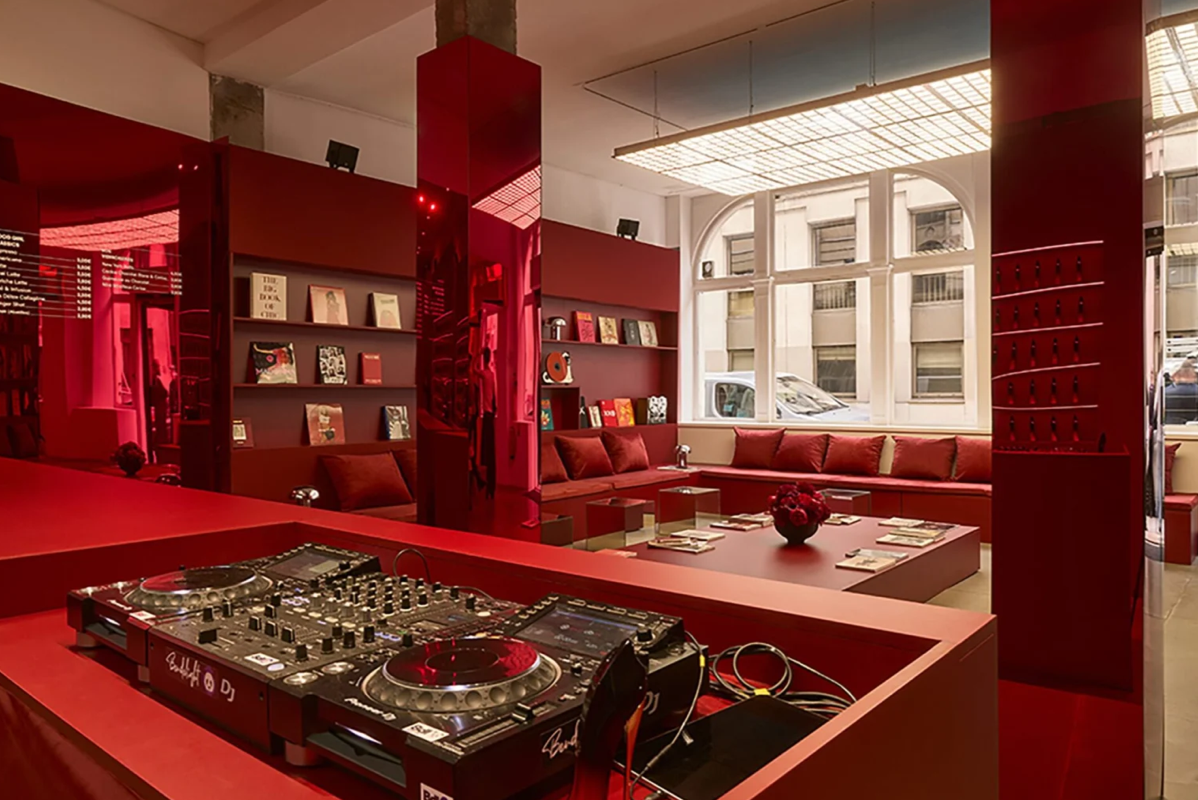 A custom immersive brand environment in deep red